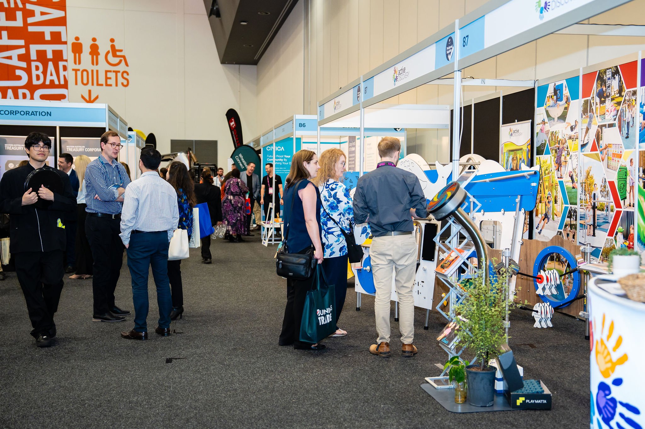 people talking at an expo